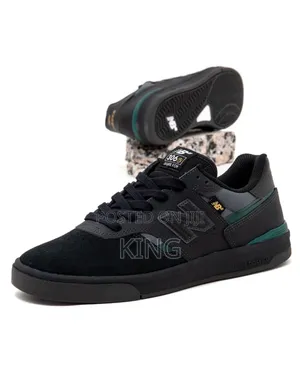 New Balance Numeric Jamie Foy 306 Cup Shoe in Black and Green.