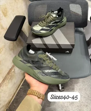 Adidas Adizero Adios Pro 4 Running Shoe in Focus Olive .