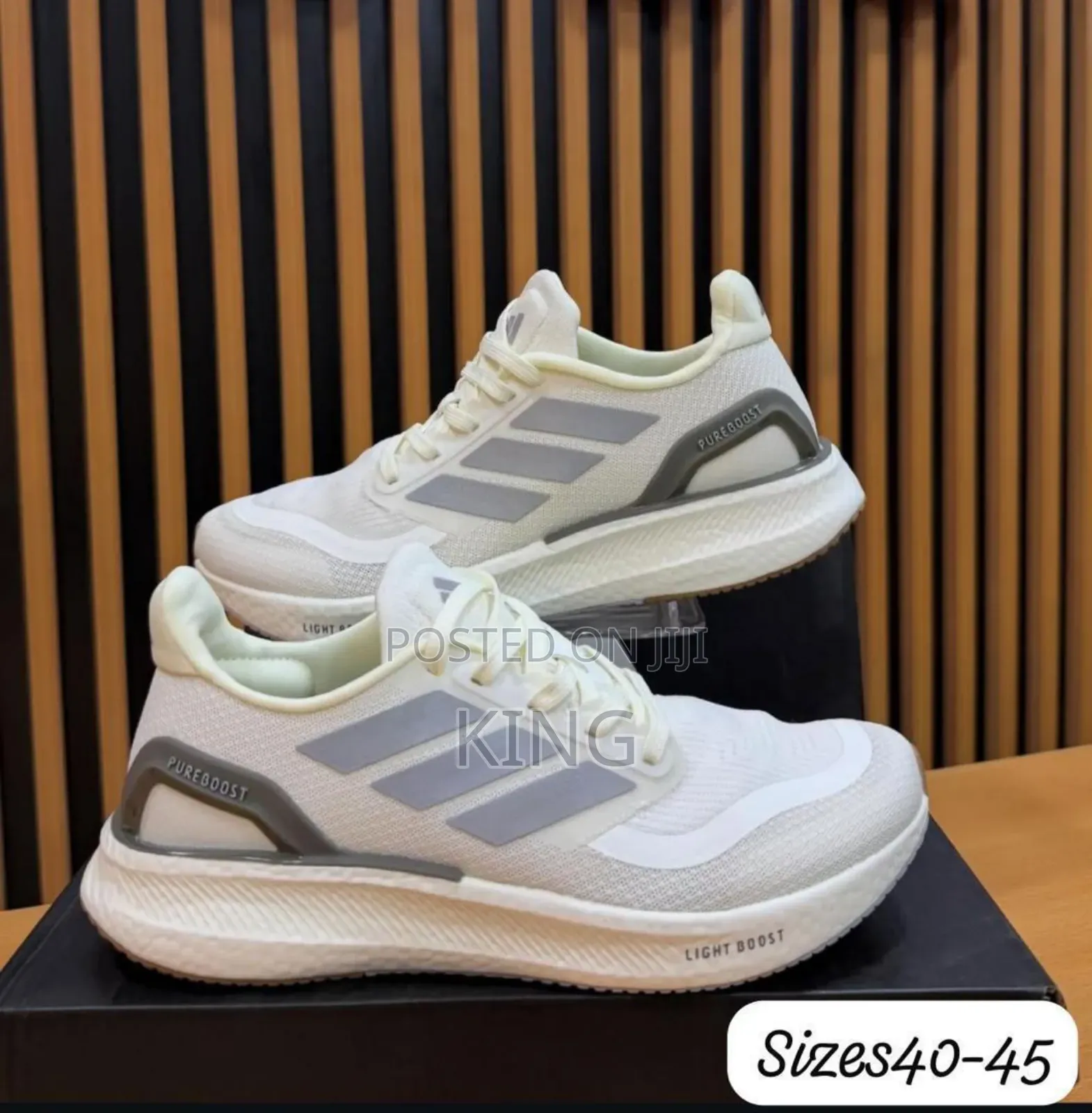 Adidas Pure Boost 5 Running Shoes.