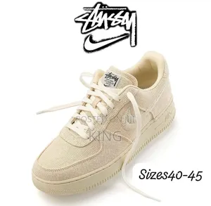 Nike Air Force 1 Low "Stüssy Fossil" Sneakers.