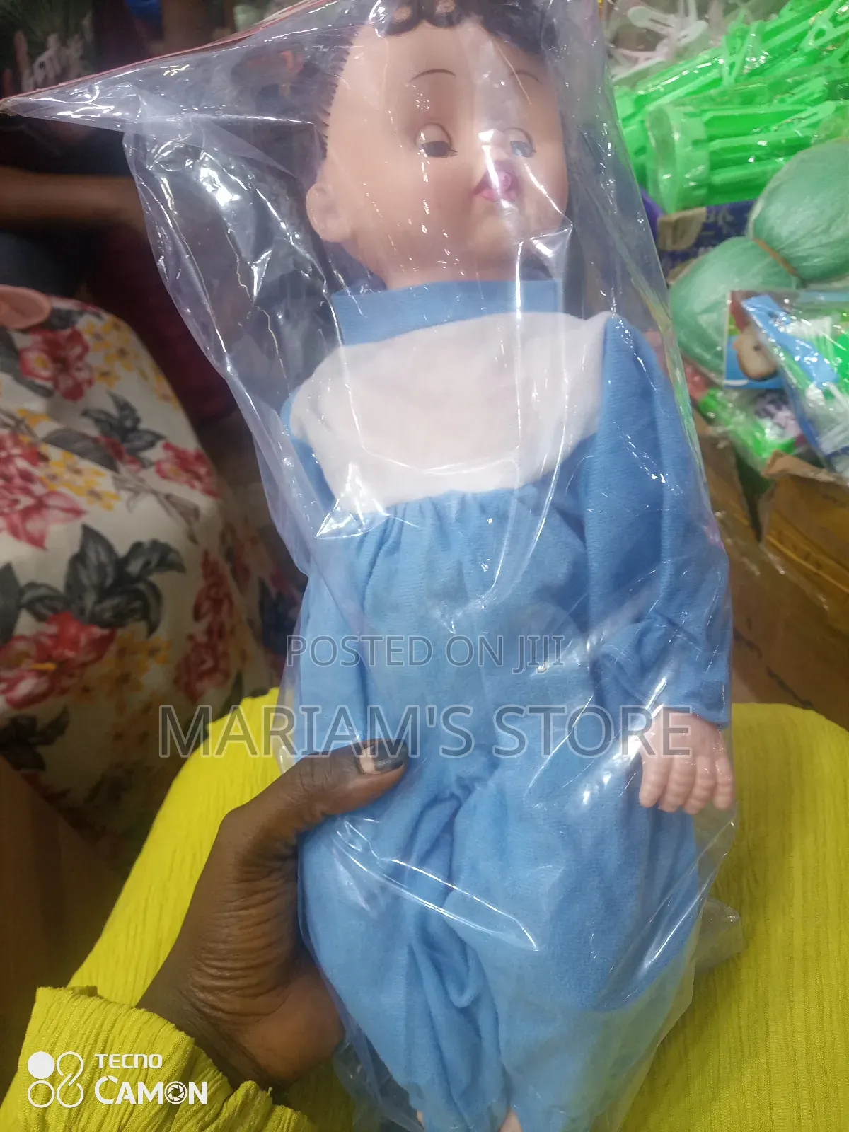 Plastic Baby Doll Packaged in Plastic.