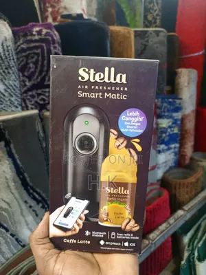 Stella Smart Matic Air Freshener With a Caffe Latte Scent Refill.