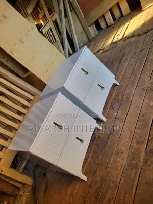Well Furnished White Bedside Drawers With Unique Handles