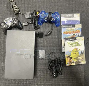 Sony Playstation 2 Console W/ 2 Controllers, 8mb Mc, 10 Games