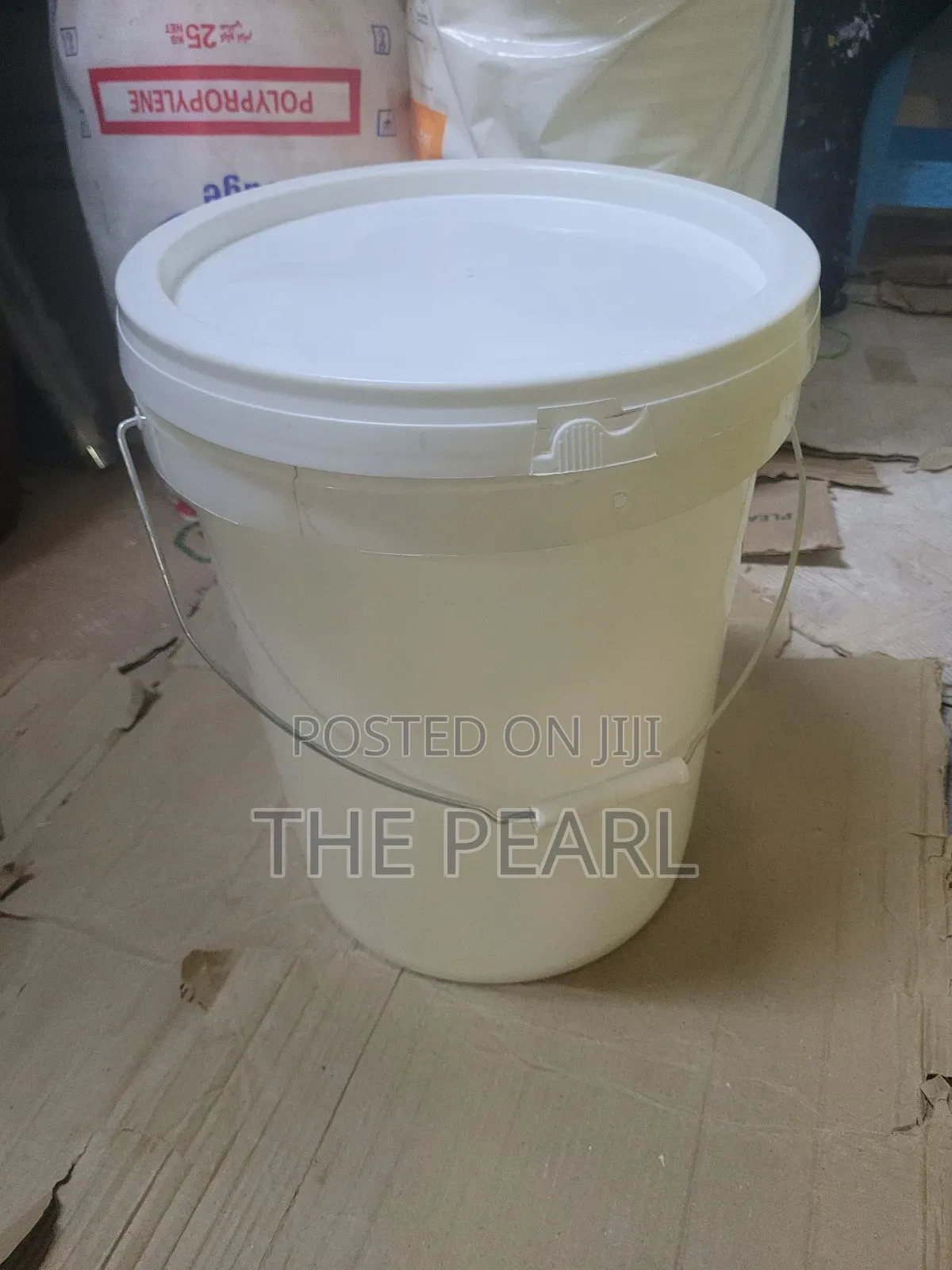 Plastic White Bucket With a Seal