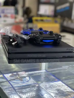 Ps4 Pro (Playstation 4 Pro) Full Set With 2 Controllers and 20 Games