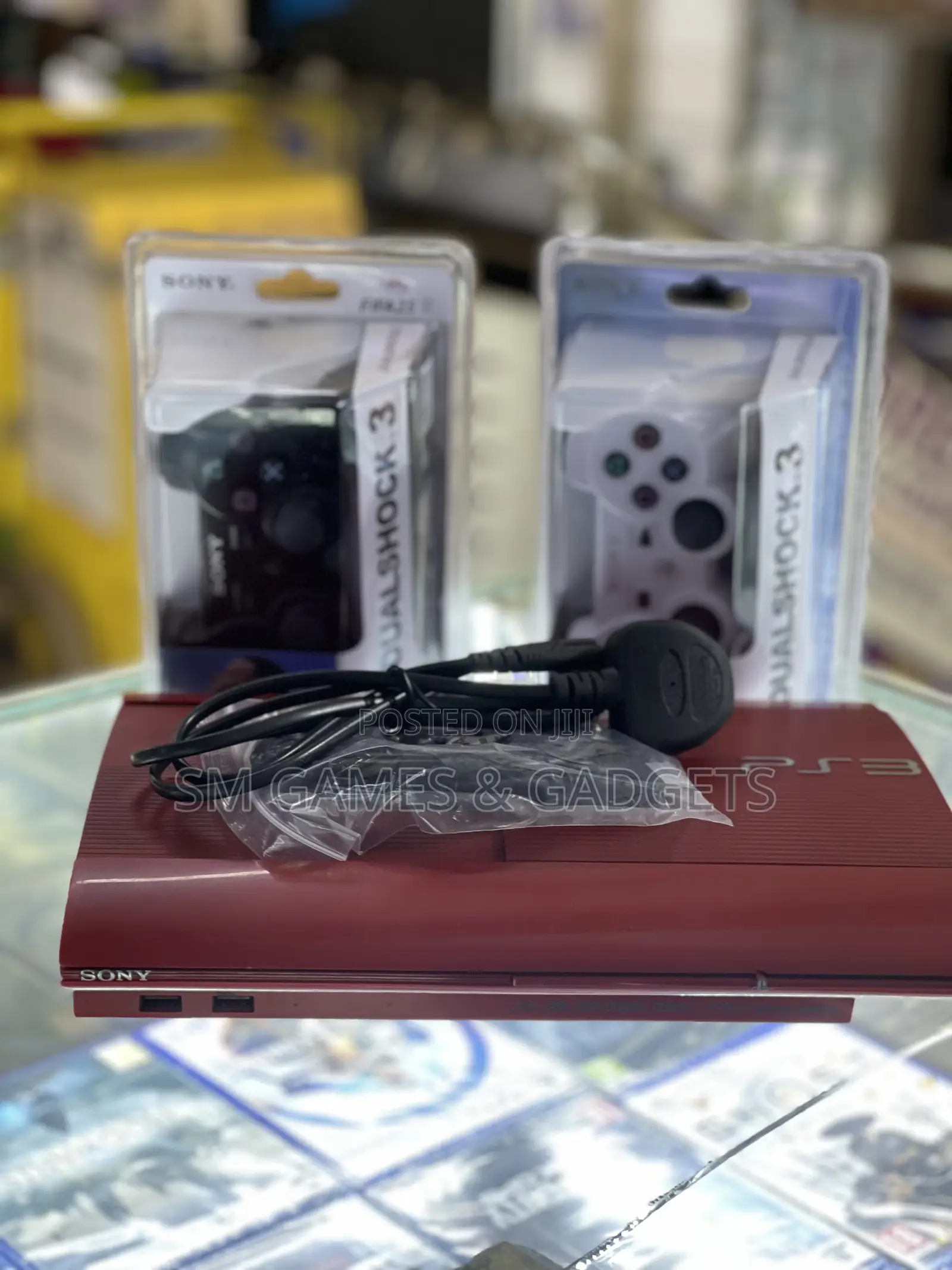 Chipped Ps3 Super Slim With 2 Controllers and 10 Games
