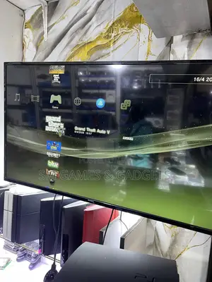 Chipped Ps3 Super Slim With 2 Controllers and 10 Games