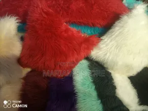 Soft, Fluffy Faux Fur Cushions and Throw Blankets.