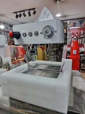 Coffee Maker Machine With A Coffee Grinder