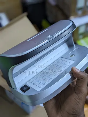 Multi-Function Counterfeit Money Detector With a Magnifier