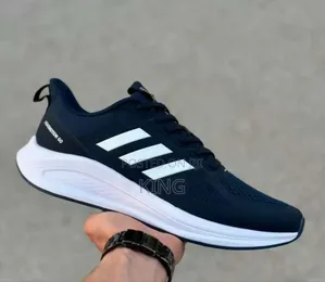 Adidas Runfalcon 5 in a Dark Navy Blue Color.
