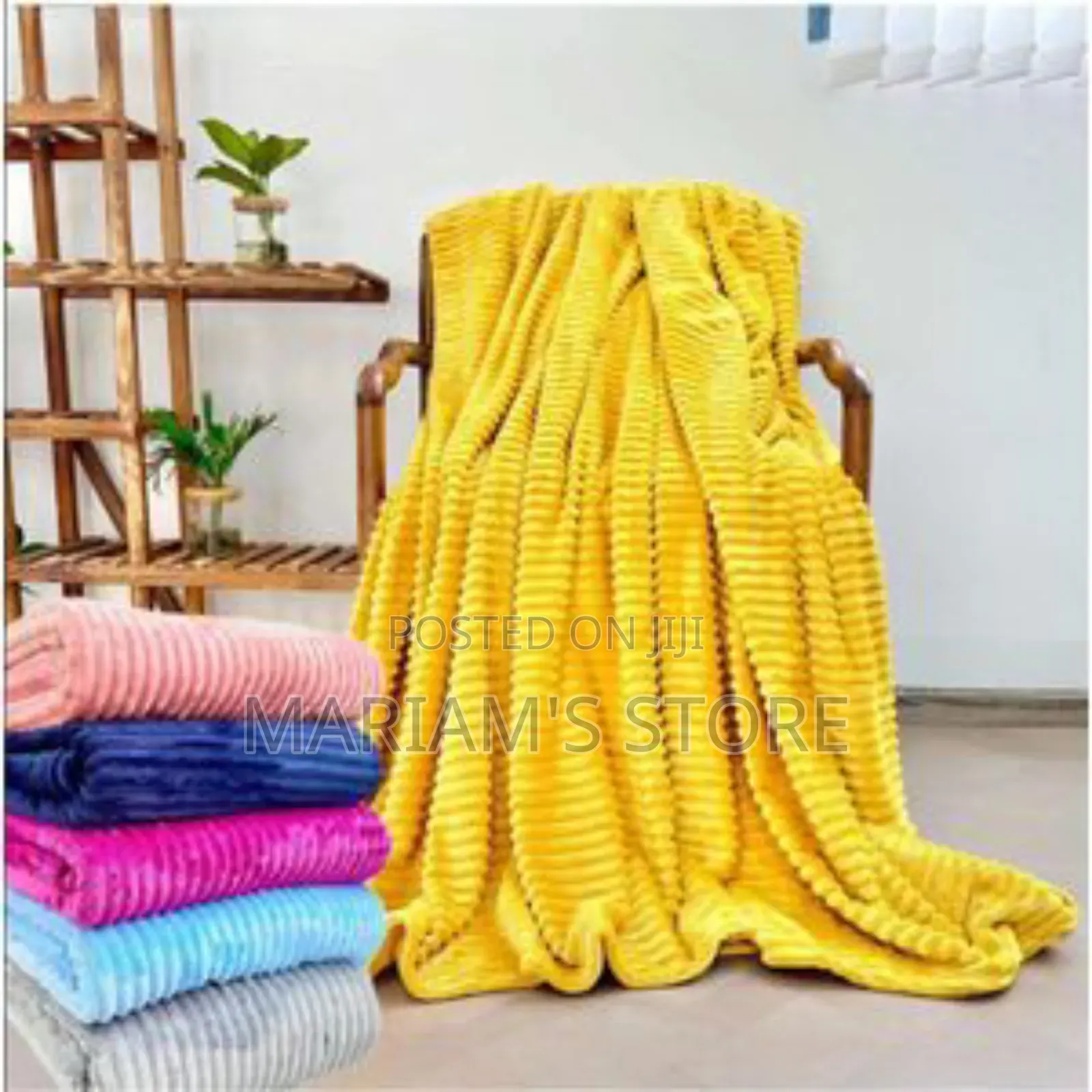 Stack of Soft, Ribbed Plush Fleece Throw Blanket