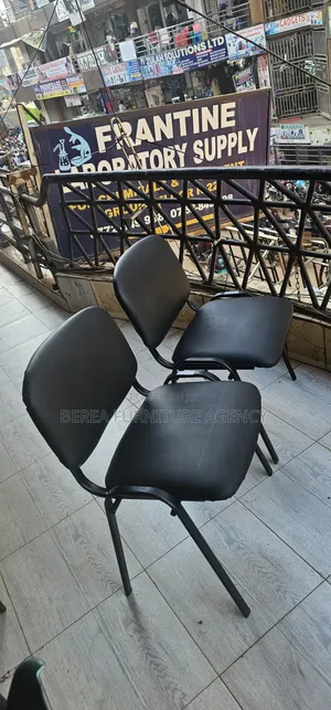 2 Pieces of Leather Stackable Chairs