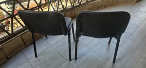 2 Pieces of Leather Stackable Chairs