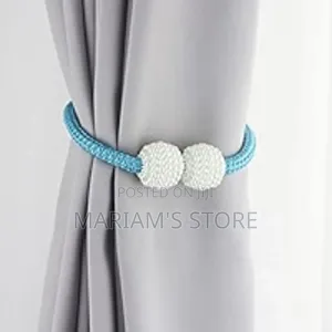 Decorative Magnetic Curtain Tiebacks With a Blue Braided Rope