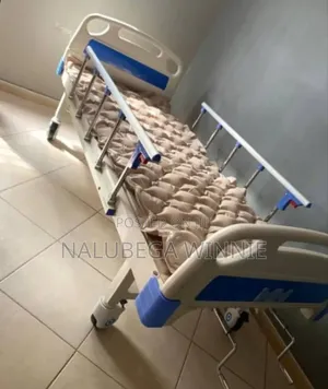 Double Crack Hospital Bed With an Air Mattress