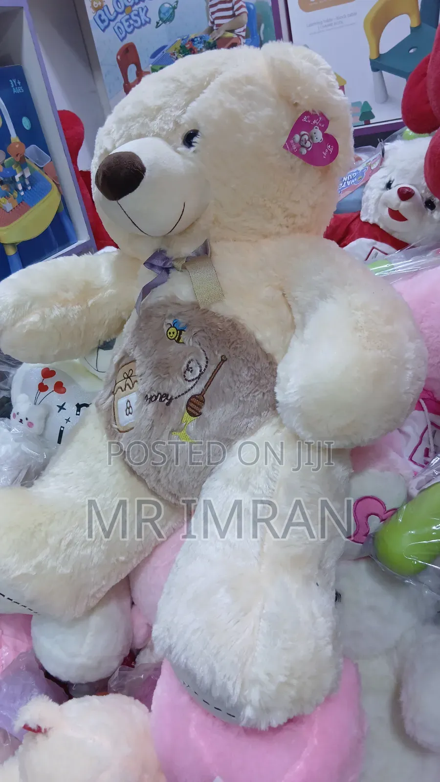 Large, Cream-Colored Stuffed Teddy Bear Toy