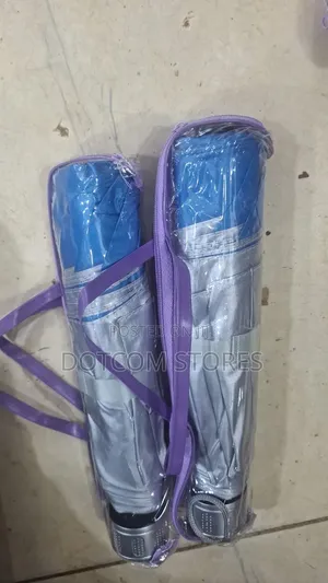 Portable, Foldable Sun And Rain Umbrella.