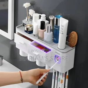 Multifunctional Wall-Mounted Toothpaste Dispenser and Holder .