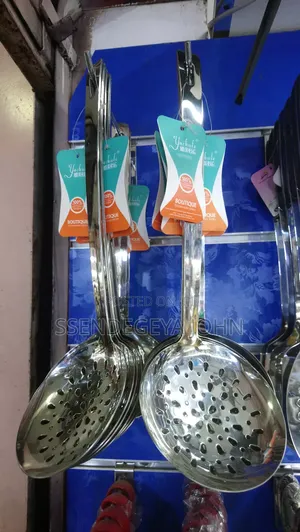 A Stainless Steel Kitchen Skimmer Spoon