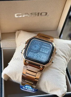 Rose Gold Strapped Casio Digital Men's Wrist Time Piece