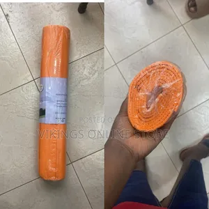 An Orange Yoga Mat, a Portable Exercise Accessory