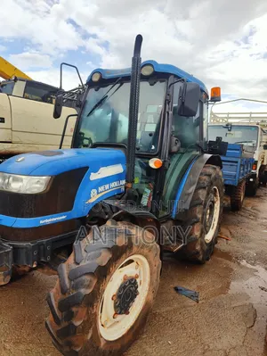 New Holland Tractor Tt 65 With Trailer
