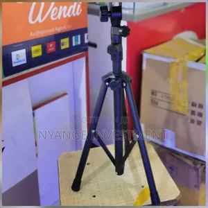 Tripod Projector Stand With a Flat Tray Surface, Likely for Projector.