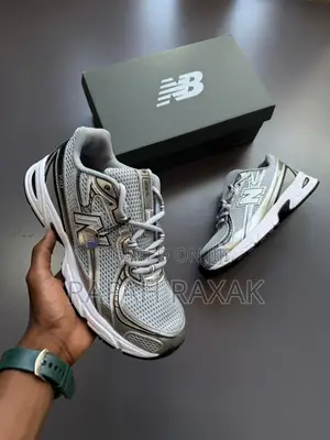 Pearl Grey New Balance 740 Classic Trainers