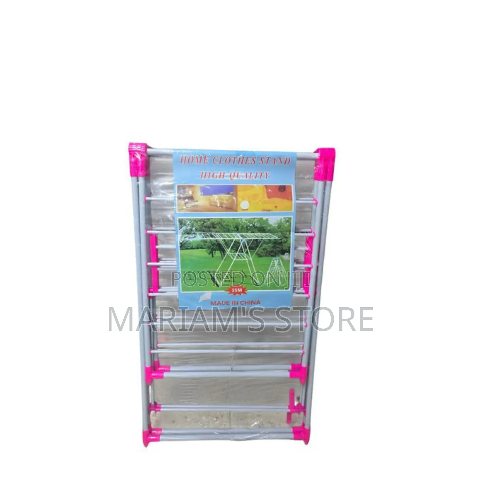 Foldable Clothes Drying Rack With a Pink and White Frame.