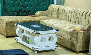 Sofa With Cup Holders and a Centre Table