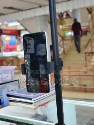 Multifunctional 360-Degree Rotating Mobile Phone Clamp.