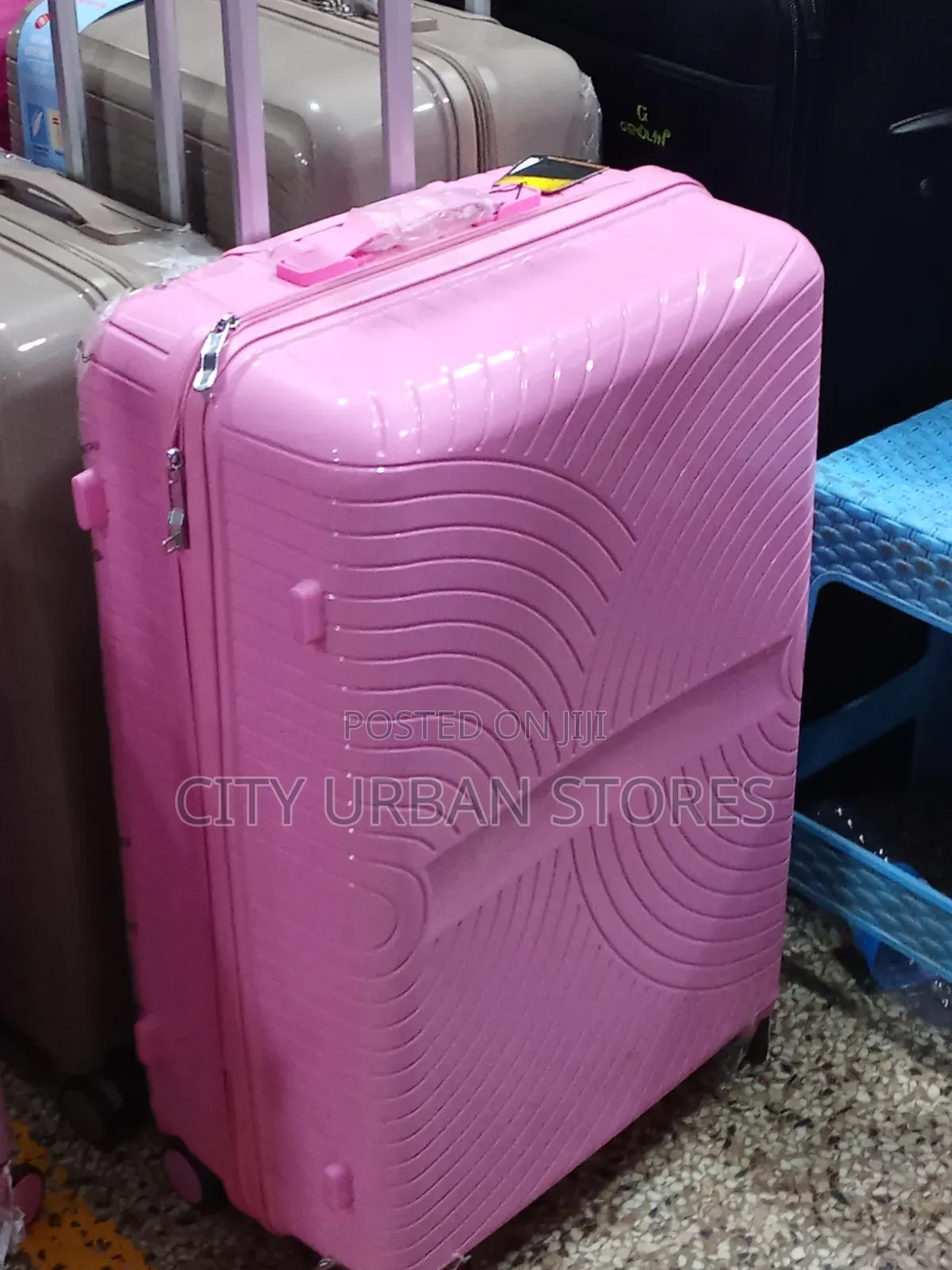 Medium Pinky Rubber Suitcase