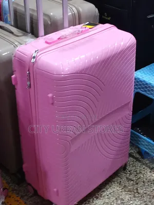 Medium Pinky Rubber Suitcase