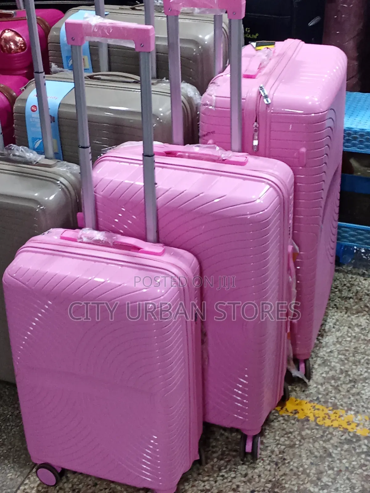 Medium Pinky Rubber Suitcase
