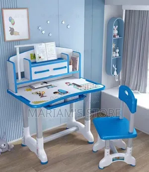 Adjustable Kids' Study Desk And Chair With An Integrated Bookshelf.