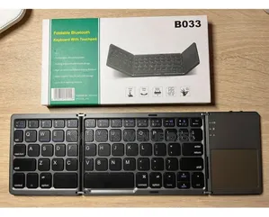 B033 Foldable Bluetooth Keyboard With a Built-in Touchpad.