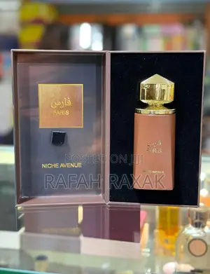 Niche Avenue Faris , a Amber Woody Fragrance