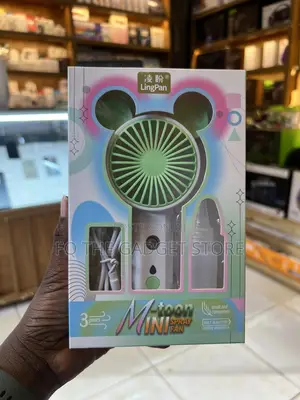 Portable Mini Fan With a Mist Spray Function.
