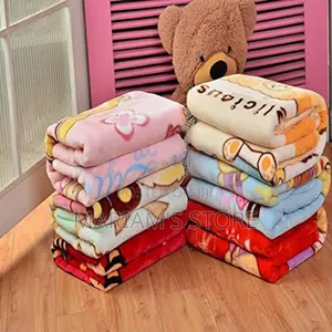 Plush Baby Blankets Available in Multiple Colors and Cartoon Designs.