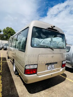 Toyota Coaster 2011 Gold