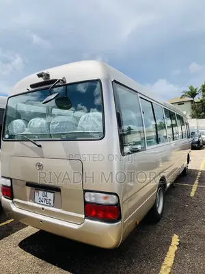 Toyota Coaster 2011 Gold