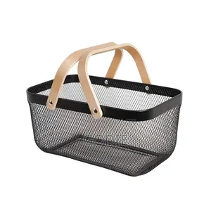 Black Metal Wire Mesh Storage Basket With Light Wood Handles.