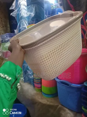 Plastic Storage Basket With a Matching Lid.
