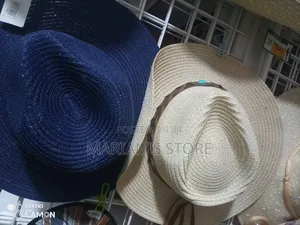 Summer Straw Sun Hats Featuring Wide Brims and Decorative Bands.]