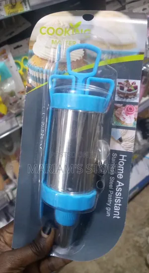 Stainless Steel Pastry Gun With Blue Plastic Components .