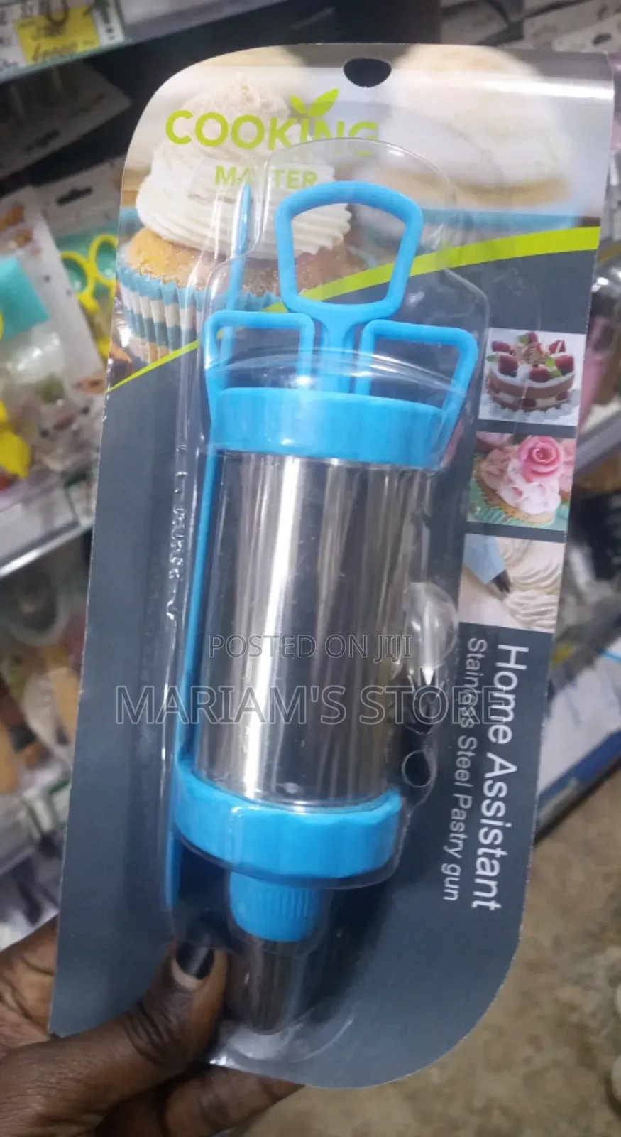 Stainless Steel Pastry Gun With Blue Plastic Components .