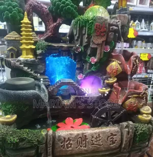 Desktop Fountain With a Waterwheel and Led Lighting.
