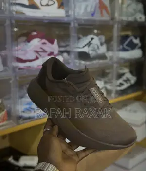 Mocha Brown Version of Adidas Adizero Evo Sl Sneakers